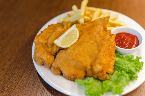 Cotoletta – włoska klasyka na talerzu: historia, przygotowanie i sekrety smaku